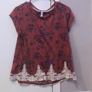 nice floral shirt with lace border at bottom